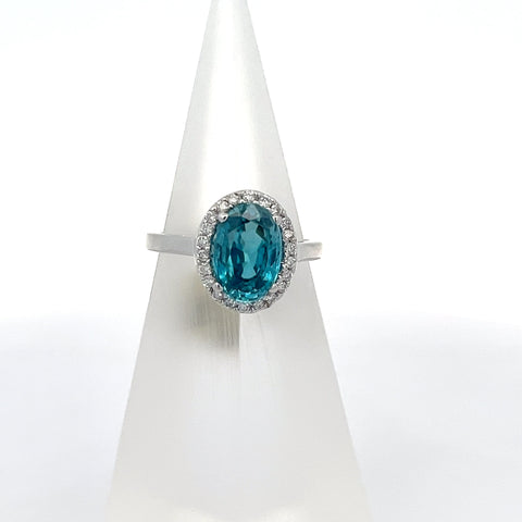 ZIR1 - 18KT WG Oval Blue Zircon Halo Ring