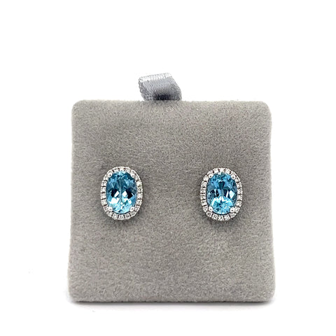 18KT WG Oval Aqua and Diamond Halo Earrings