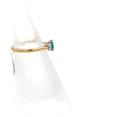 E0190 - 18kt YG/Platinum Oval Emerald and Oval Diamond Three stone Ring
