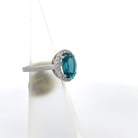 ZIR1 - 18KT WG Oval Blue Zircon Halo Ring