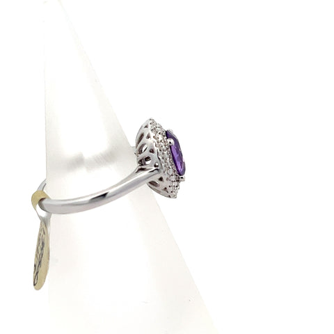 PS0217 - 18kt WG Purple Oval Sapphire with a double Diamond halo Ring