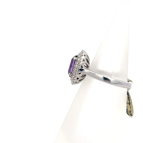 PS0217 - 18kt WG Purple Oval Sapphire with a double Diamond halo Ring