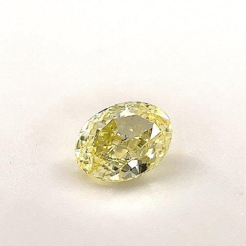 Natural Fancy Yellow 0.50ct Oval