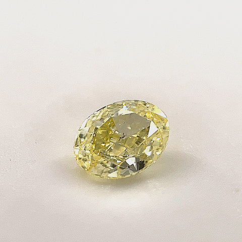 Natural Fancy Yellow 0.50ct Oval